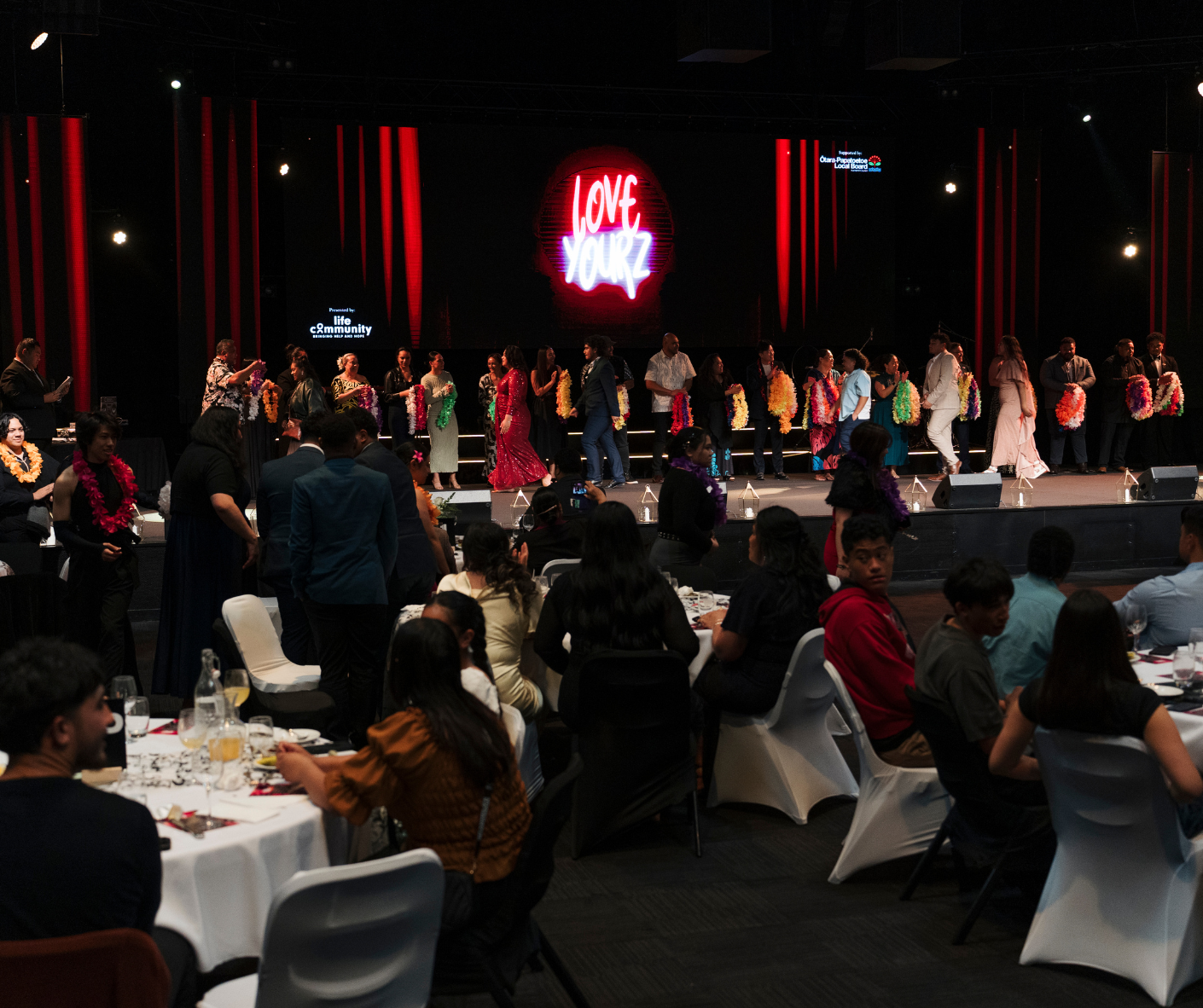 Award recipents on stage.