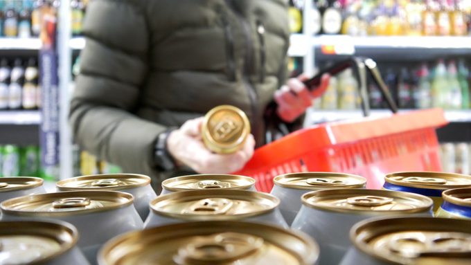 Beer selection by customer at supermarket