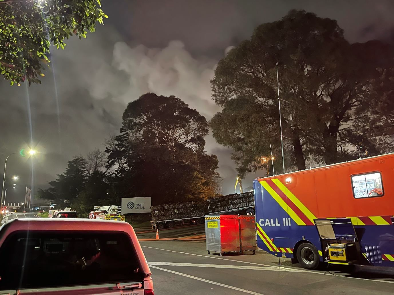 Billowing smoke from scrap metal fire at Simsmetal in 2023.