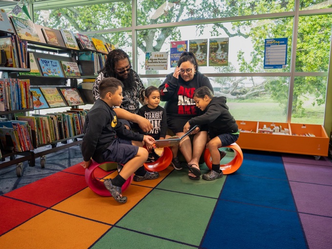 A family enjoying reading time at the local library