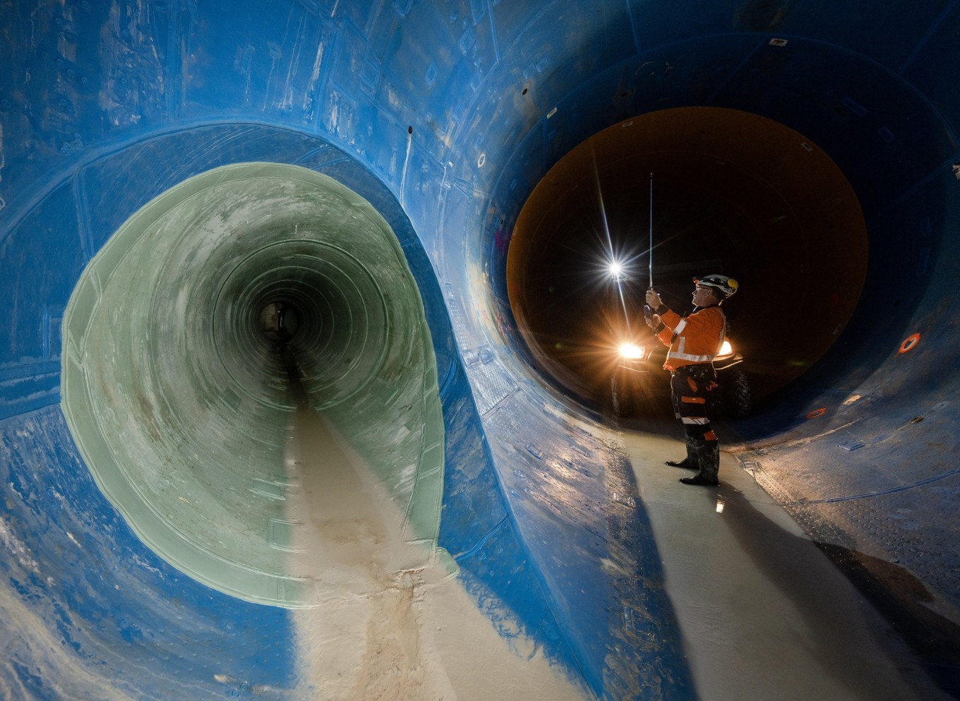 A worker inspecting the integrity of a tunnel. 