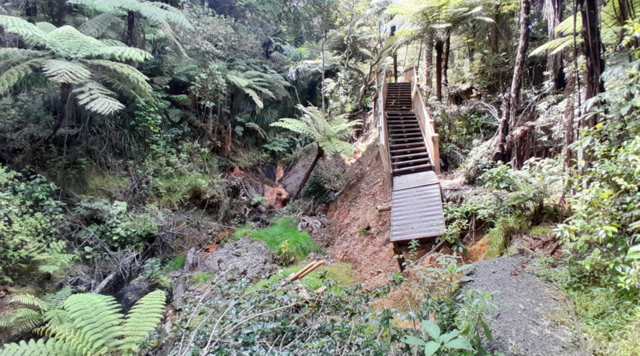 Storm damage to the track near Onewa Road before repairs began.