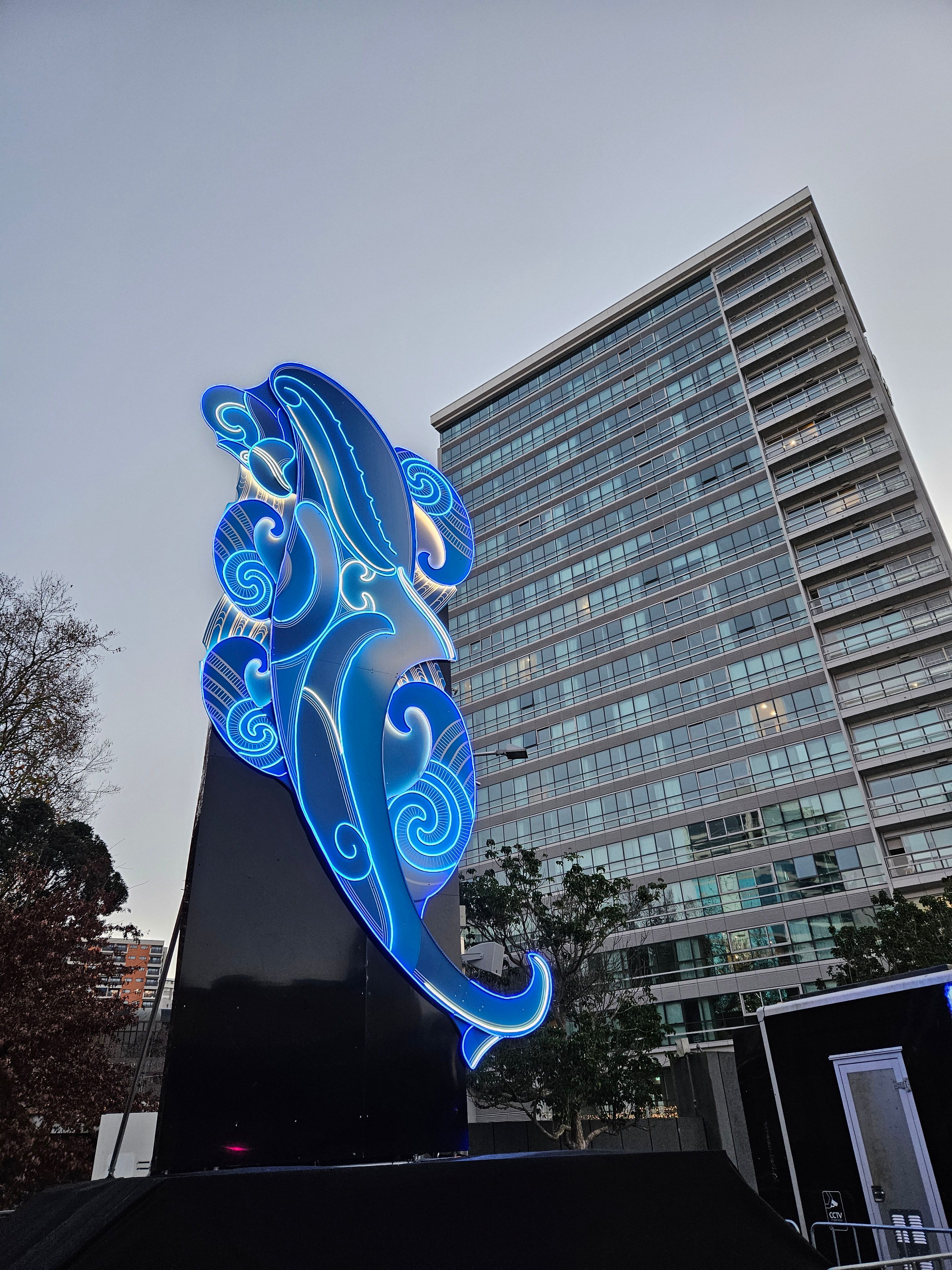 Blue neon Māori design.