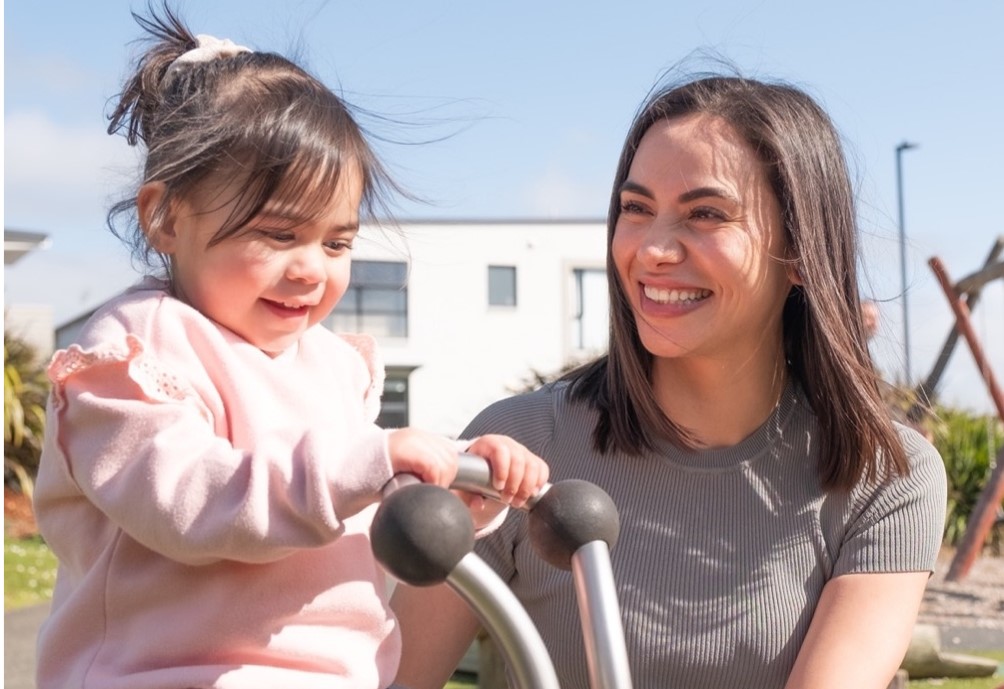Young girl and woman at the park. 