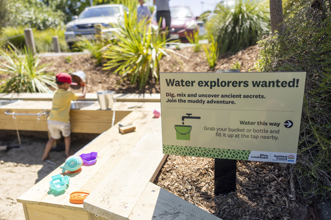 Sand kitchen with tools and buckets