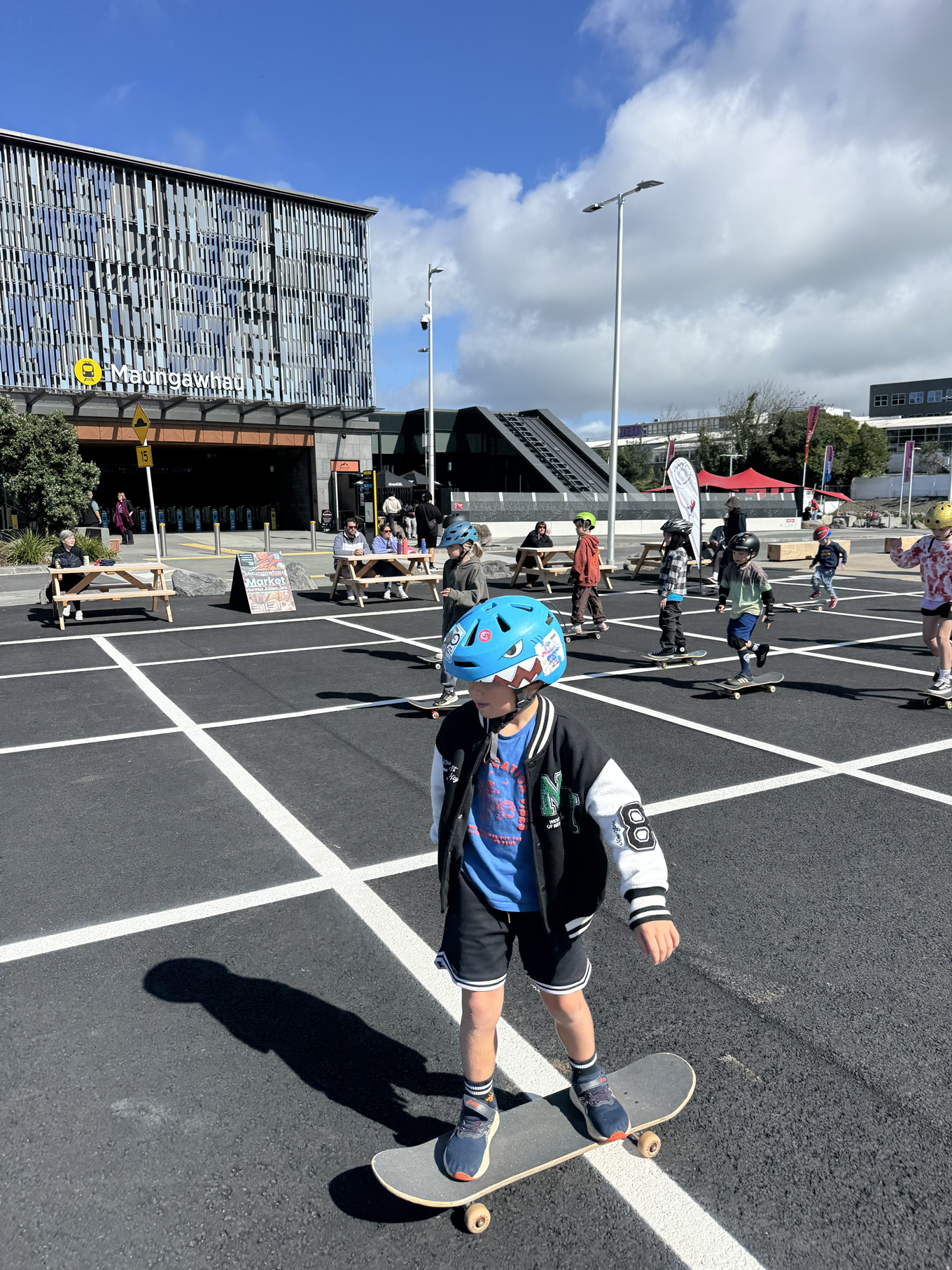 A child riding a skateboard. 