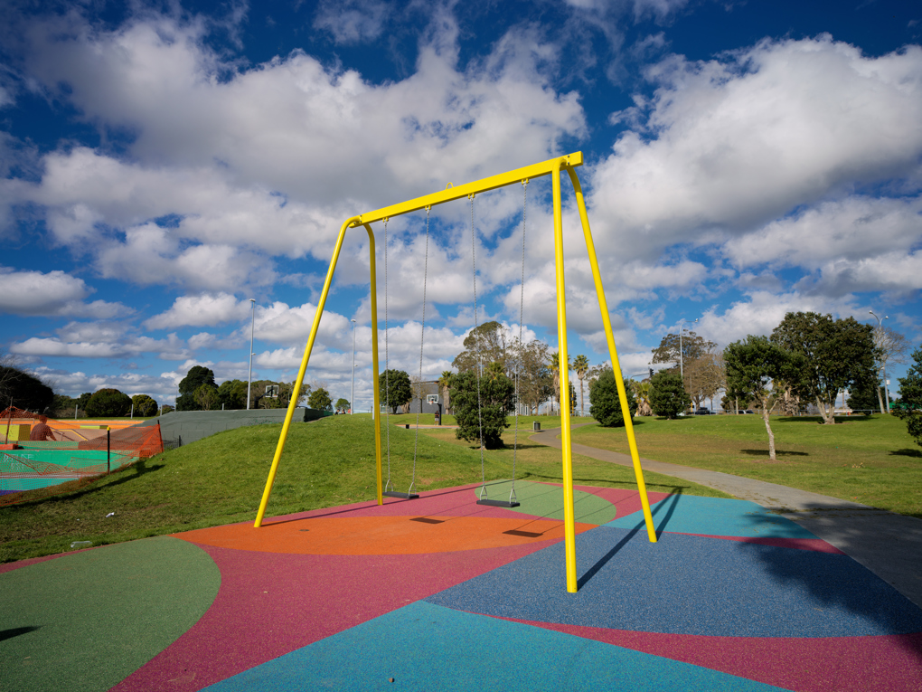 A yellow swingset