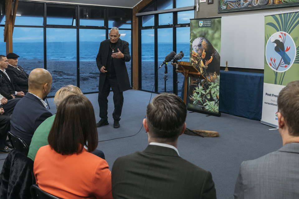 A man presenting at a community event.