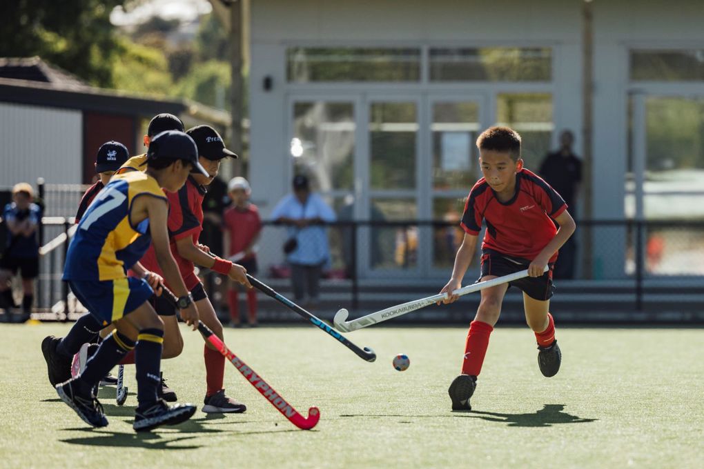 Kids playing hockey