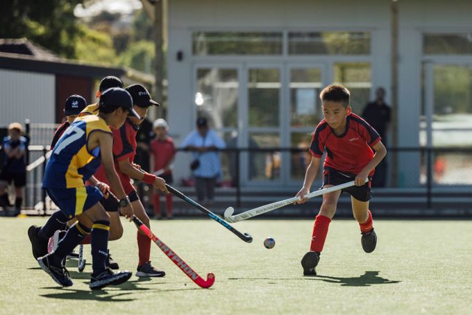 Kids playing hockey
