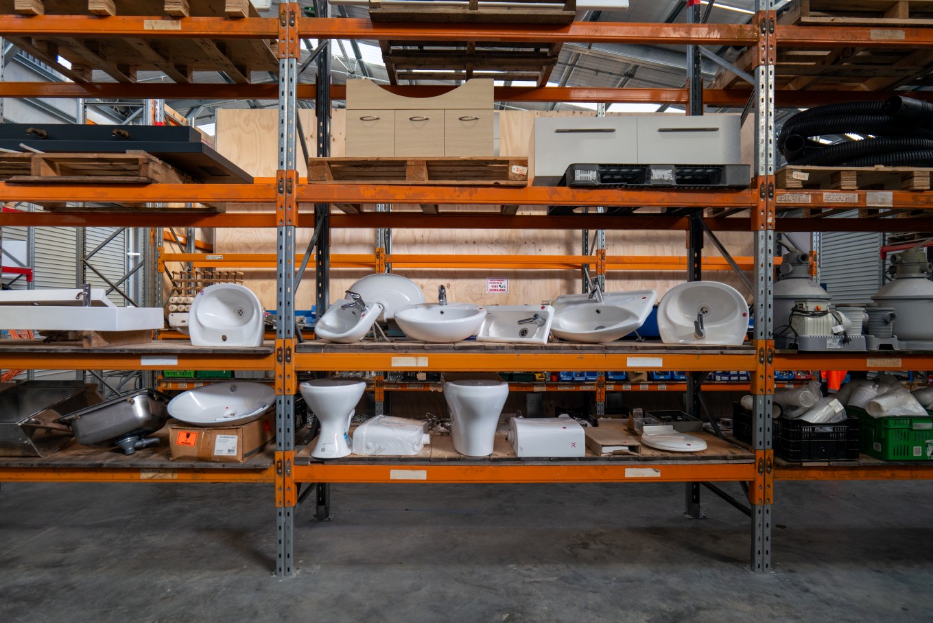 Various repurposed items such as toilet seats and wood at the Community Recycling Community. 