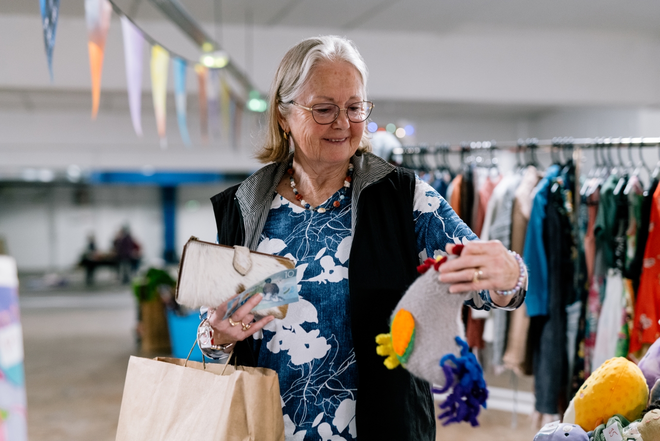 A lady buying some clothes. 
