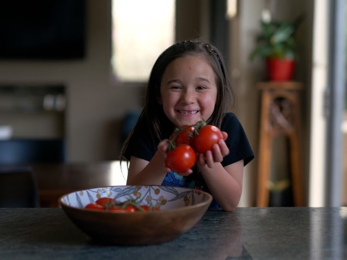 Girl With Tomatoes