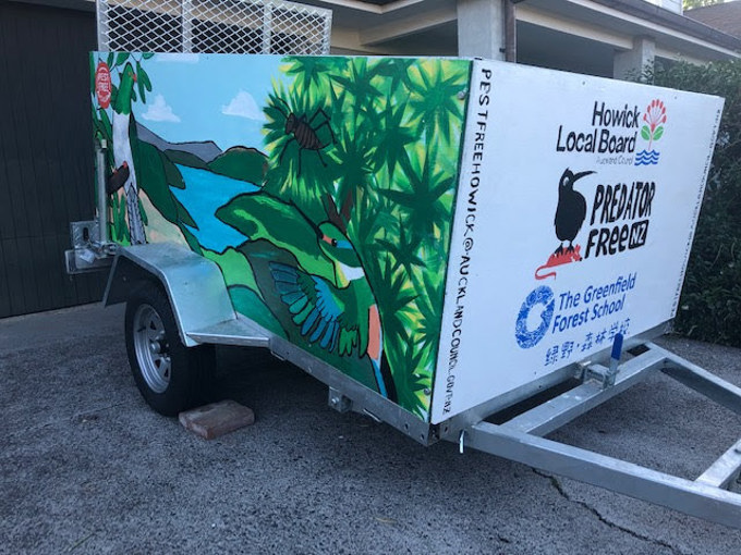 Students create colourful murals for pest free trailer