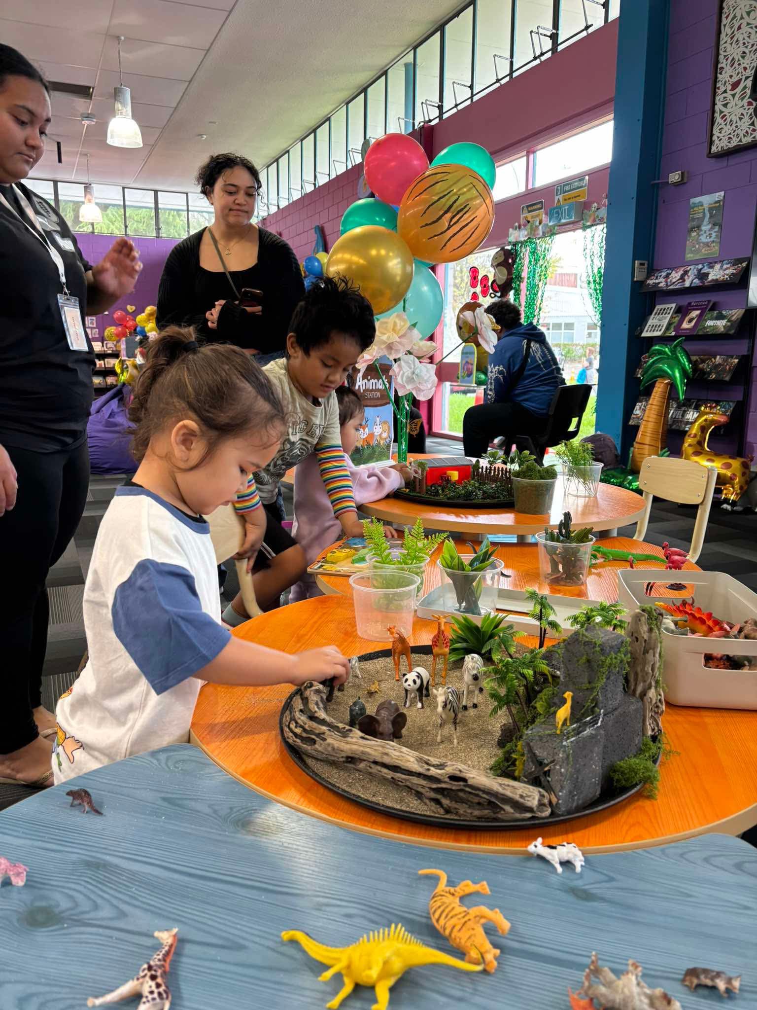 Kids playing with toys. 