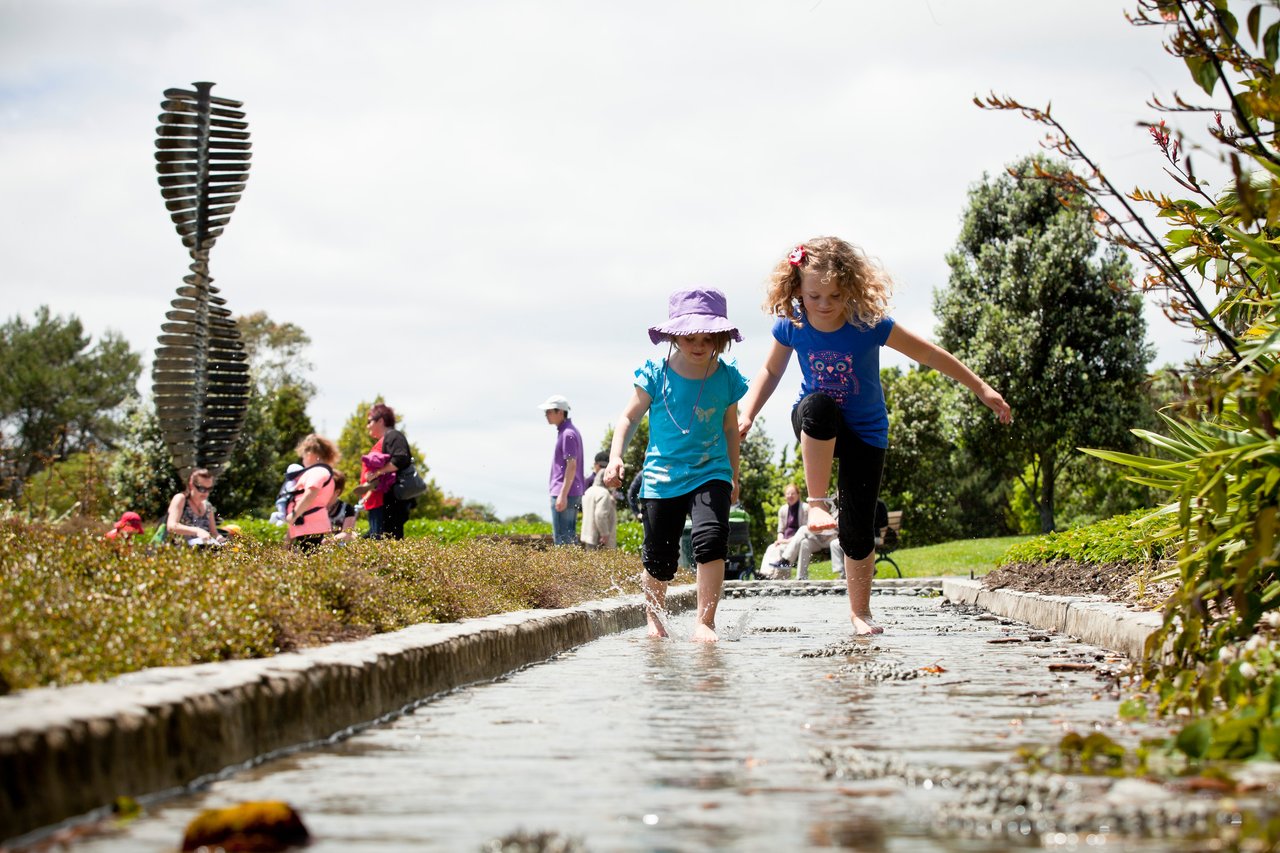 Kids playing in the puddle at Botanic Gardens. 