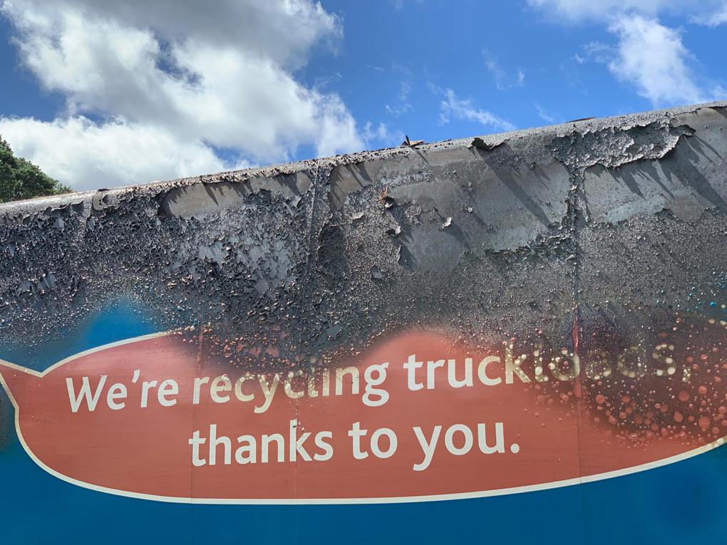 Side of rubbish truck burnt
