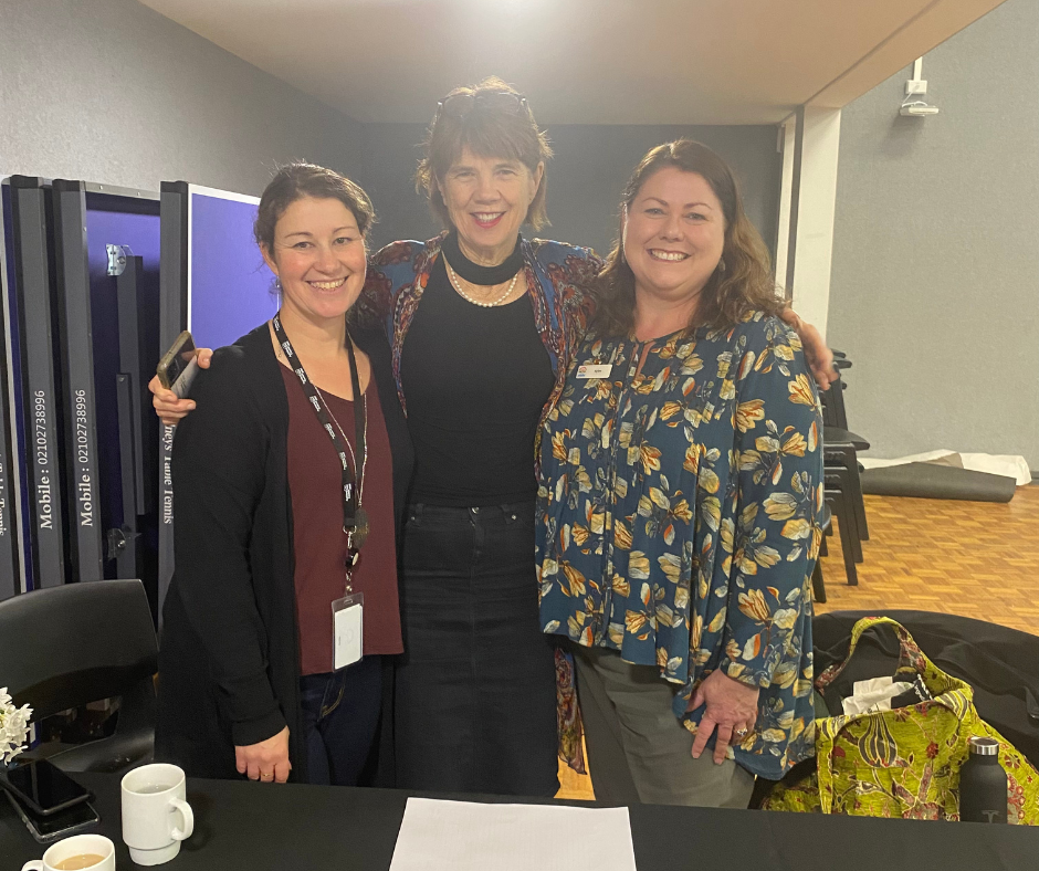 Ladies in a auditorium. 