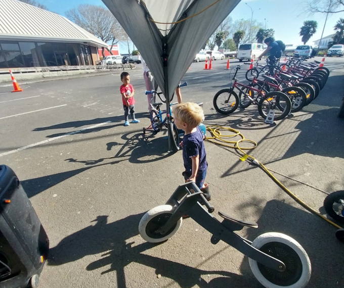 A child learning to ride a bike