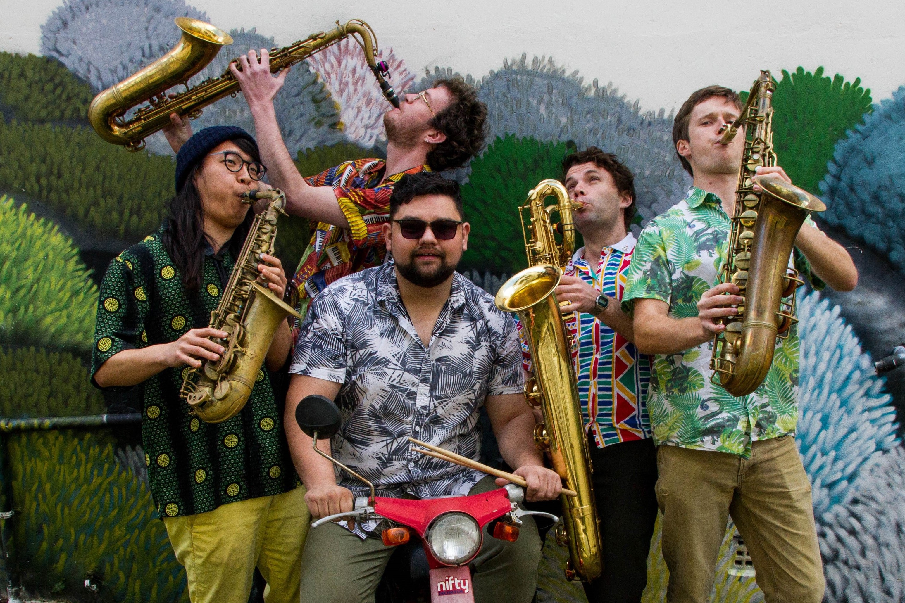 The Saxobros with their saxophones.