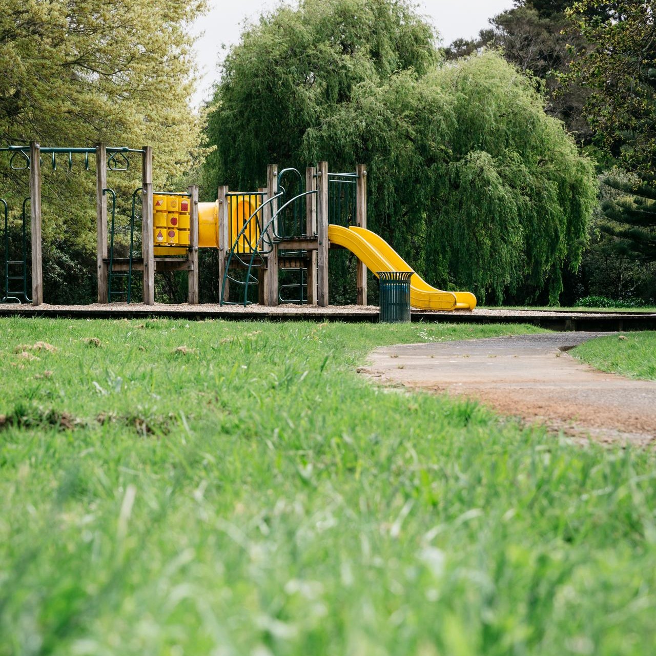 A playground and pathway. 